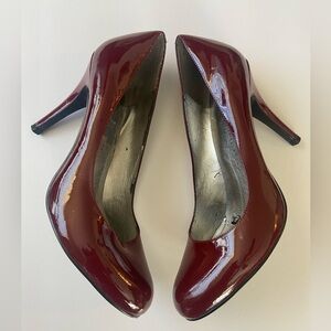 Burgundy in color. Gently used